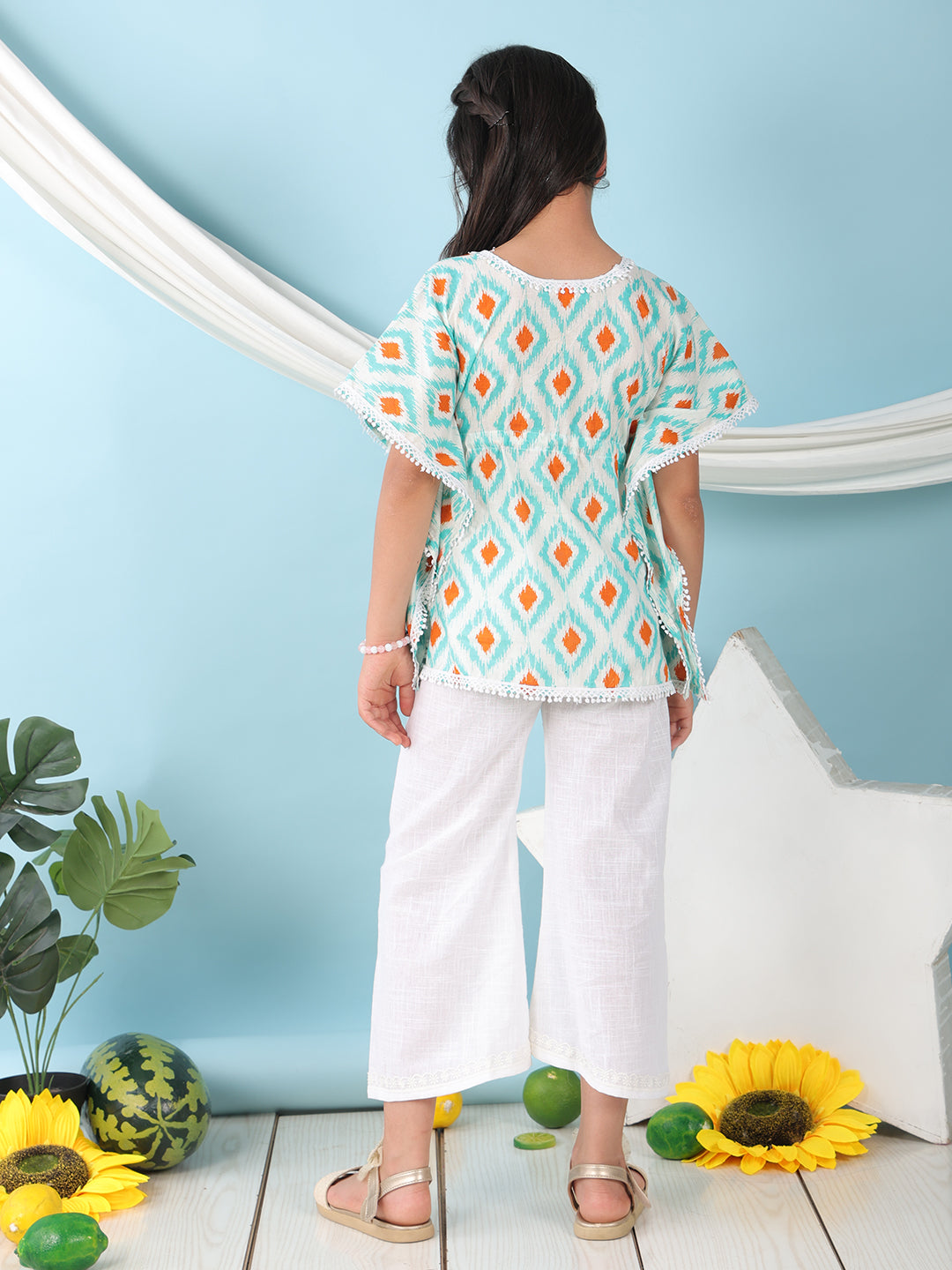 Blue checkered Printed Kaftan paired with white cotton pant