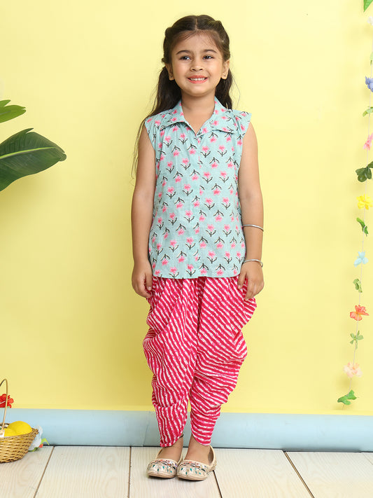 Green Floral Printed sleeveless Kurti paired with Pink lehriya Dhoti
