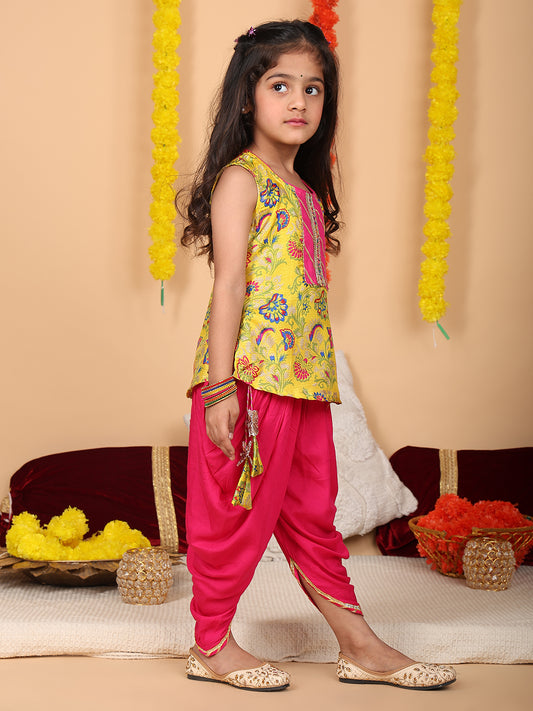 Yellow printed sleeveless kurti with Pink dhoti