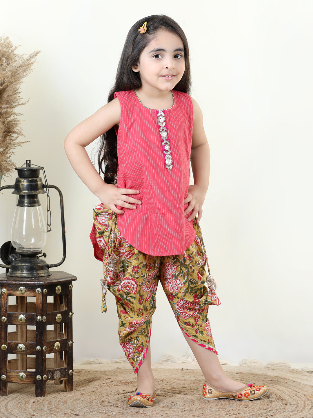 Yellow Floral printed dhoti paired with Peach katha Kurti with a lace border at the neckline