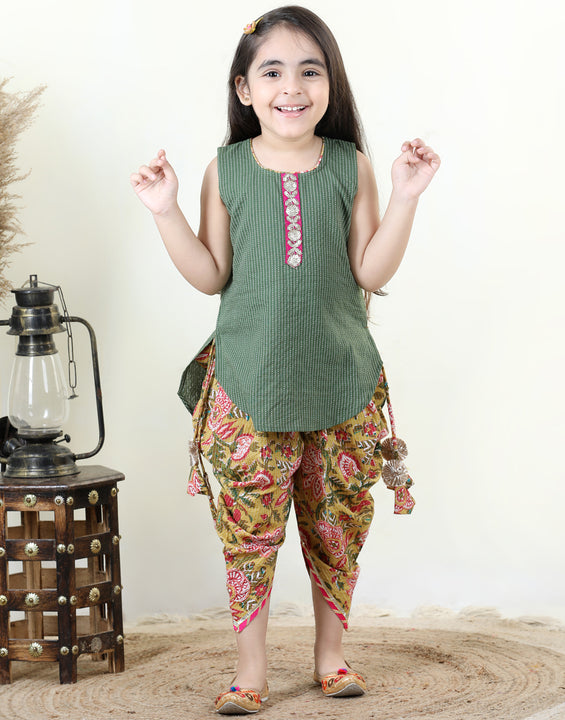 Yellow Floral printed dhoti paired with Green katha Kurti with a lace border at the neckline