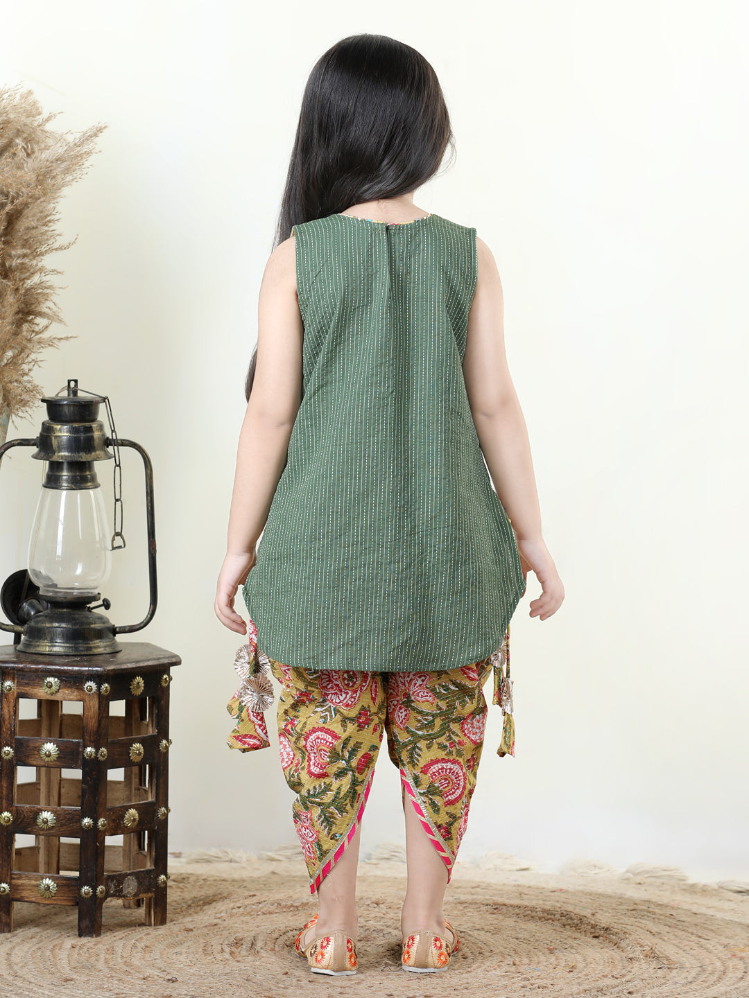 Yellow Floral printed dhoti paired with Green katha Kurti with a lace border at the neckline