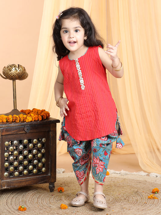 Floral printed dhoti paired with katha Kurti with a lace border at the neckline