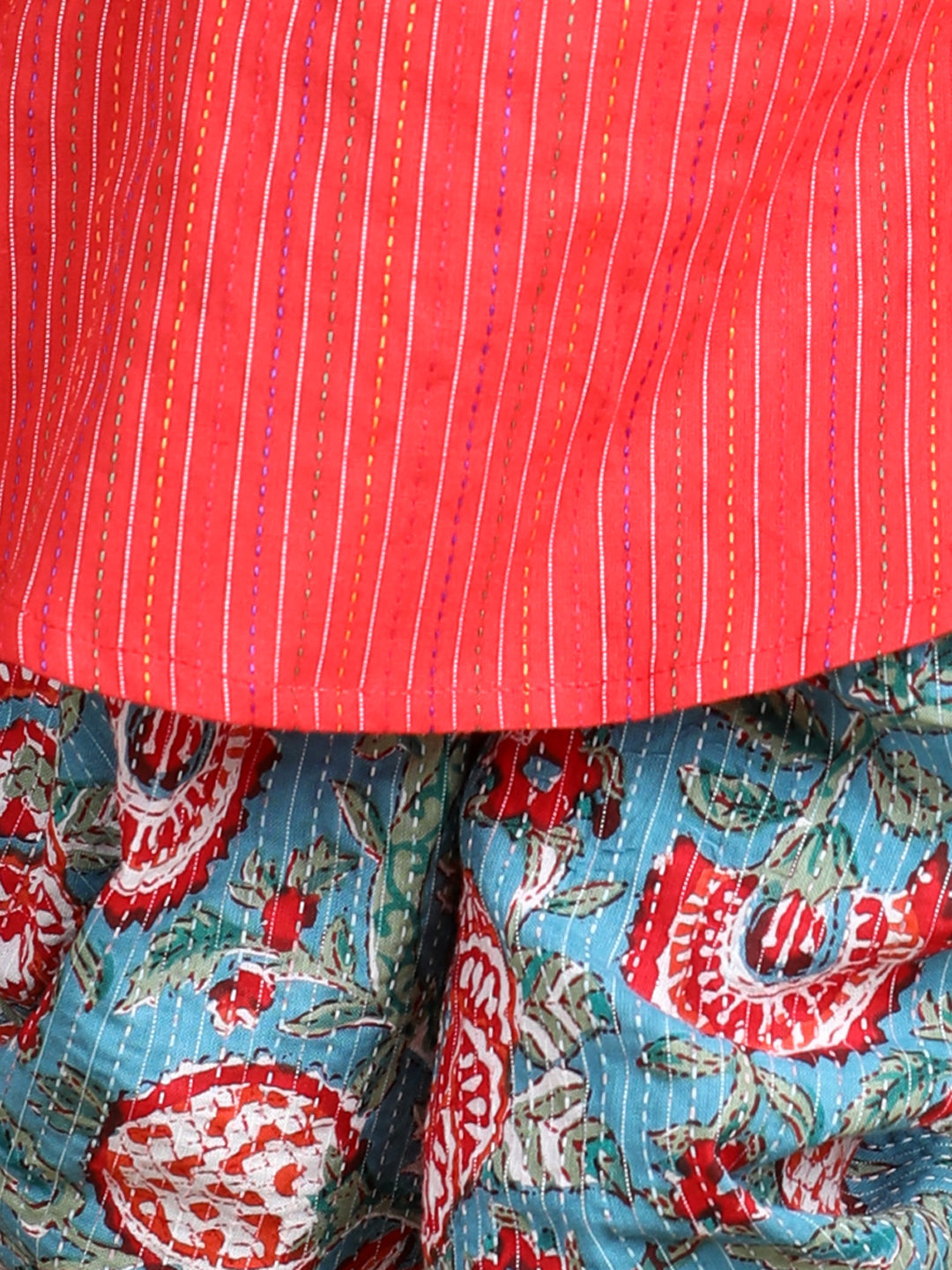 Floral printed dhoti paired with katha Kurti with a lace border at the neckline