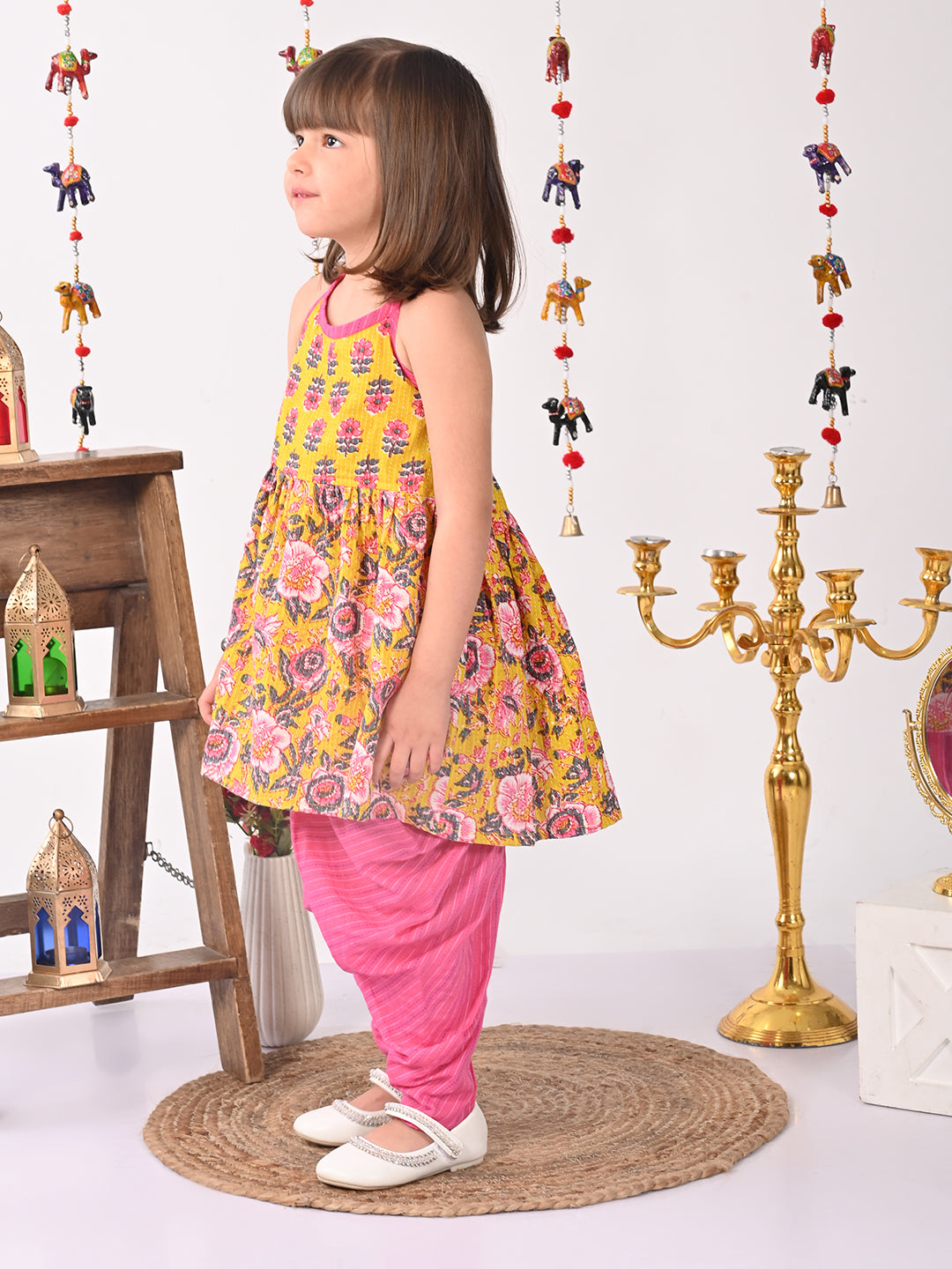 Yellow Floral halter style Kurti with pink  dhoti