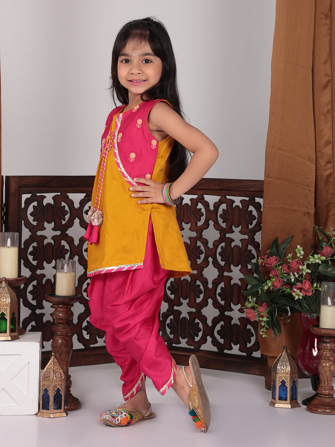 Yellow Kurti with pink embroidered attached jacket and dhoti