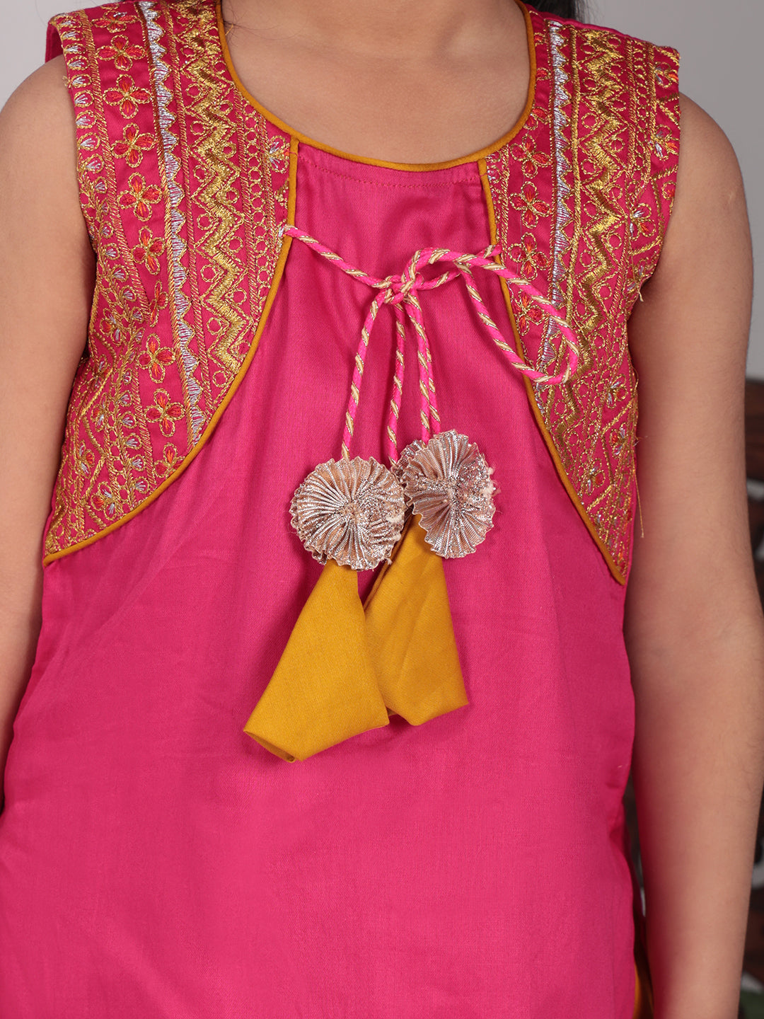 Pink embroidered attached jacket kurti with yellow dhoti