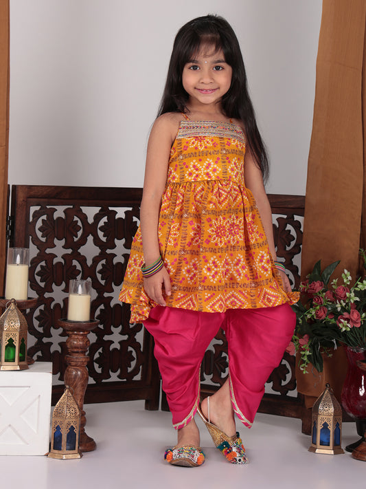 Yellow sleeveless kurti with pink dhoti