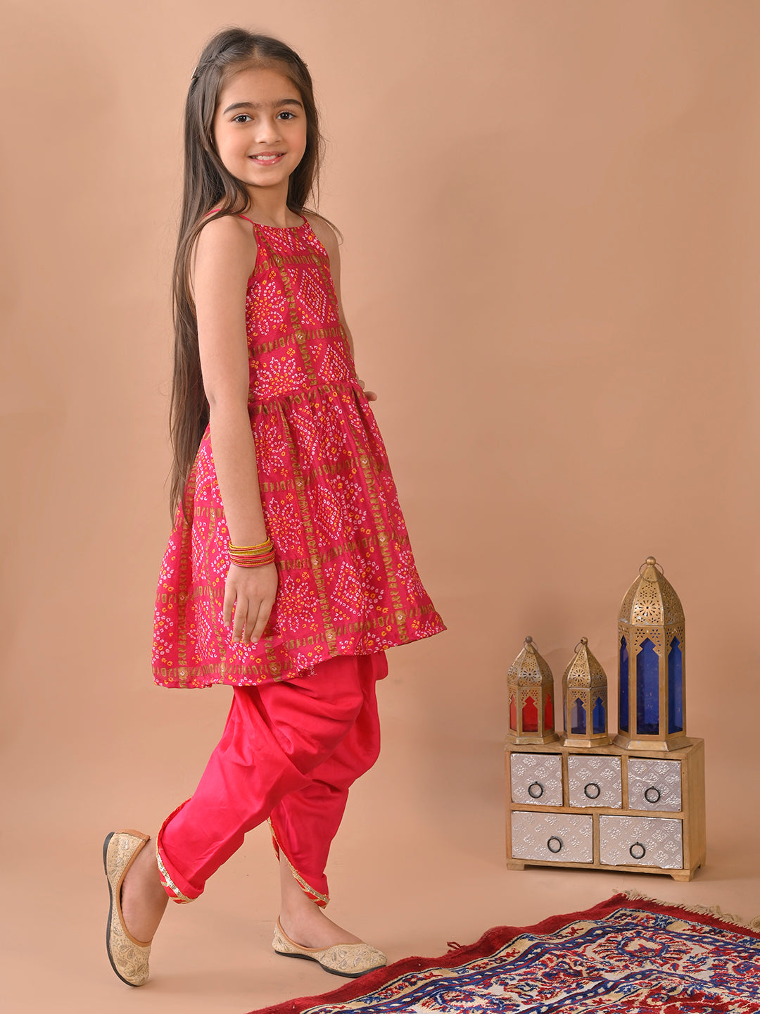 Pink Bandez printed sleeveless Kurti paired with Pink Dhoti