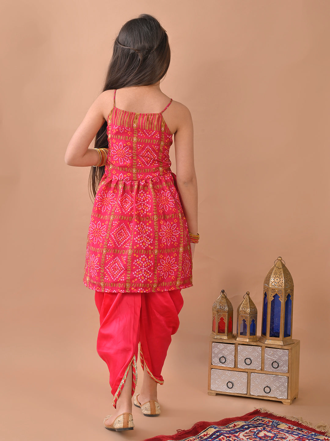 Pink Bandez printed sleeveless Kurti paired with Pink Dhoti