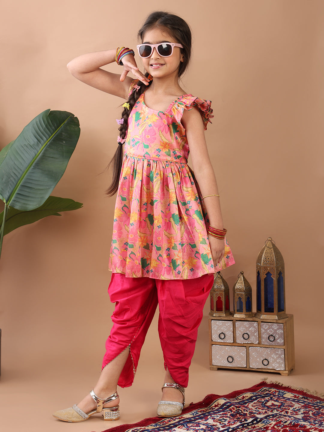 Pink Floral printed sleeveless Kurti paired with Pink Dhoti