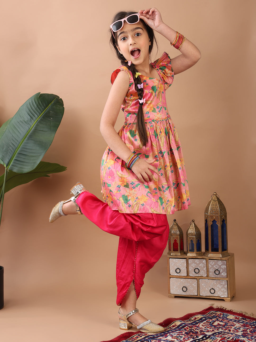 Pink Floral printed sleeveless Kurti paired with Pink Dhoti