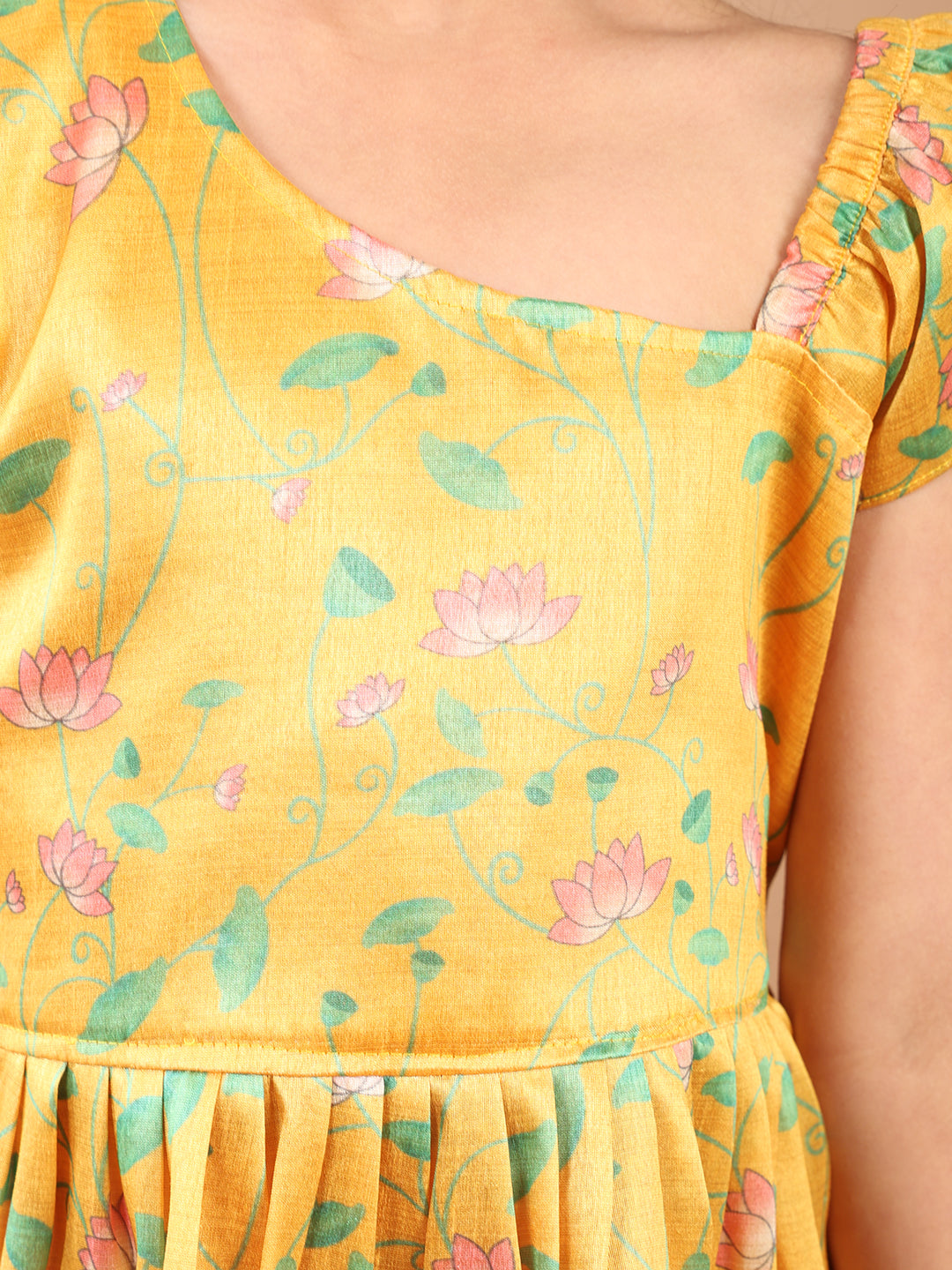 Yellow Lotus printed sleeveless Kurti paired with Pink Dhoti