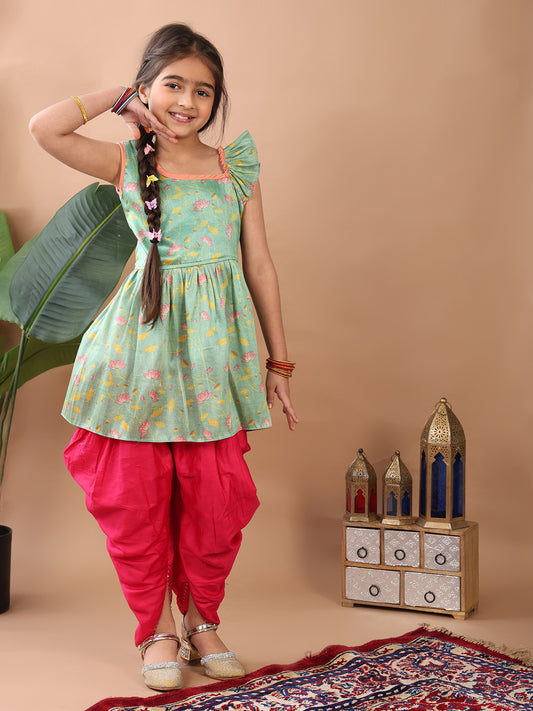 Green Lotus printed sleeveless Kurti paired with Pink Dhoti