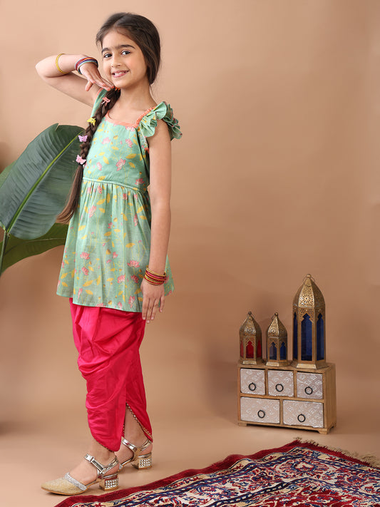 Green Lotus printed sleeveless Kurti paired with Pink Dhoti