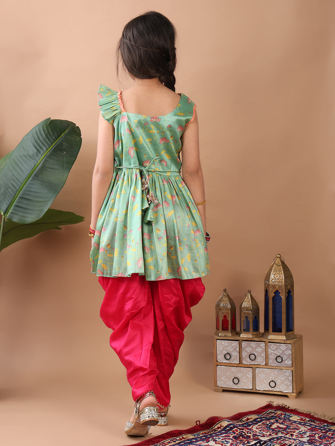 Green Lotus printed sleeveless Kurti paired with Pink Dhoti