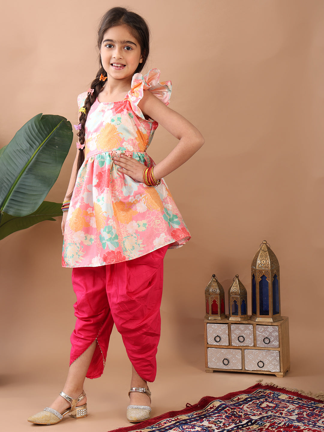 Light Pink Floral printed sleeveless Kurti paired with Pink Dhoti