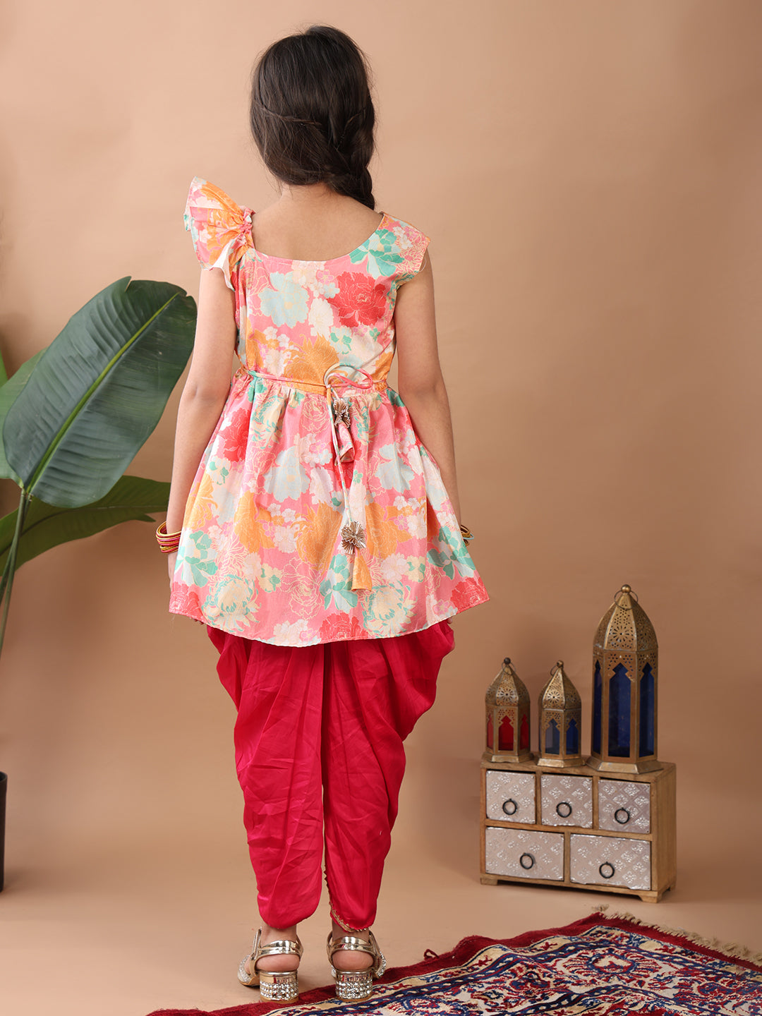 Light Pink Floral printed sleeveless Kurti paired with Pink Dhoti