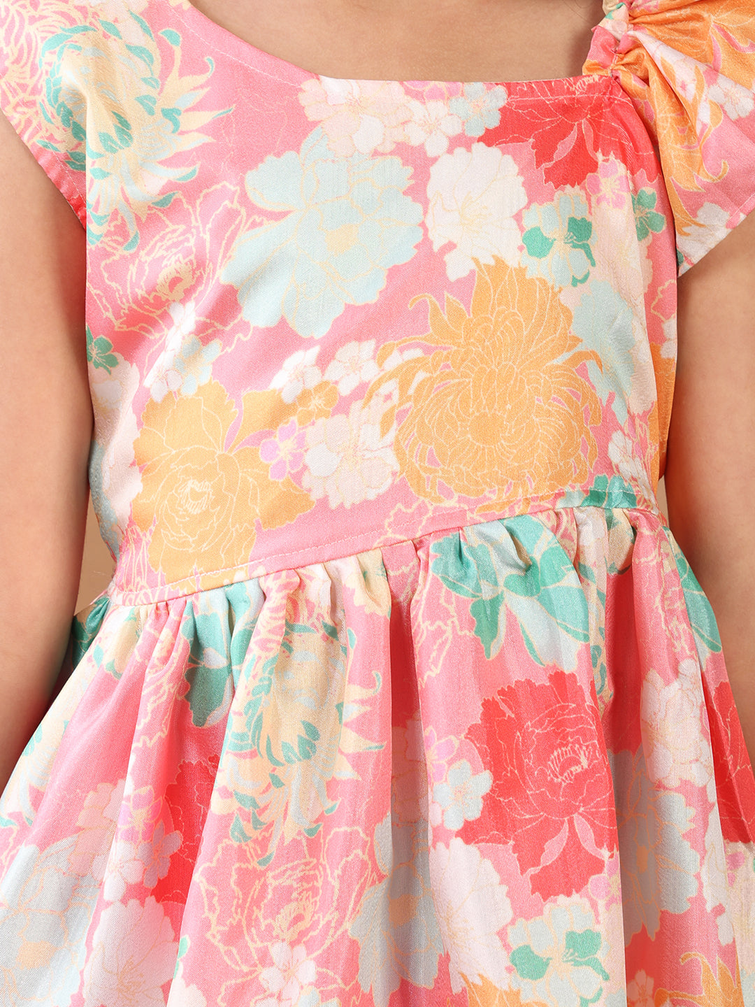 Light Pink Floral printed sleeveless Kurti paired with Pink Dhoti
