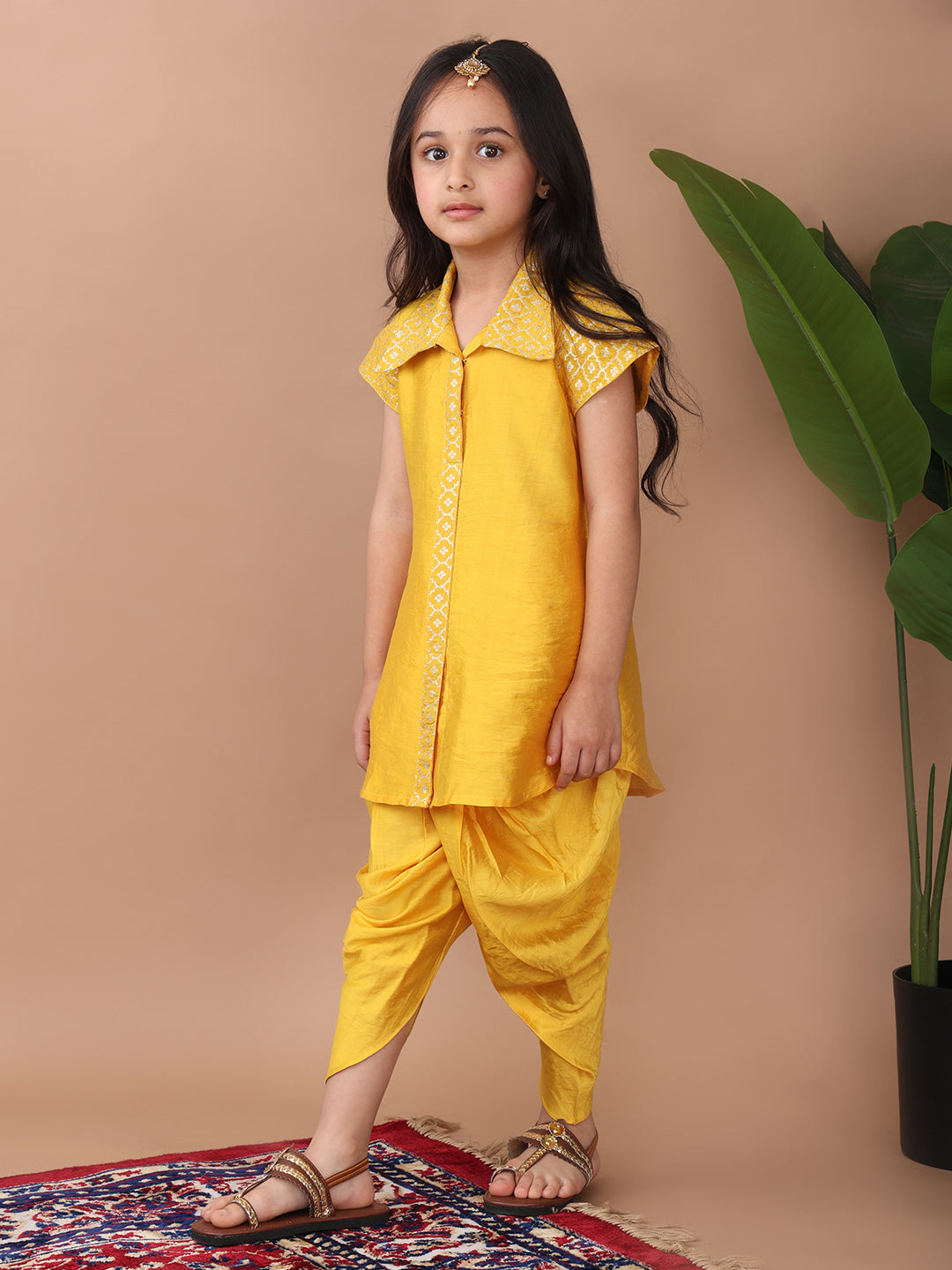 Yellow jacquard shirt Kurti paired with dhoti