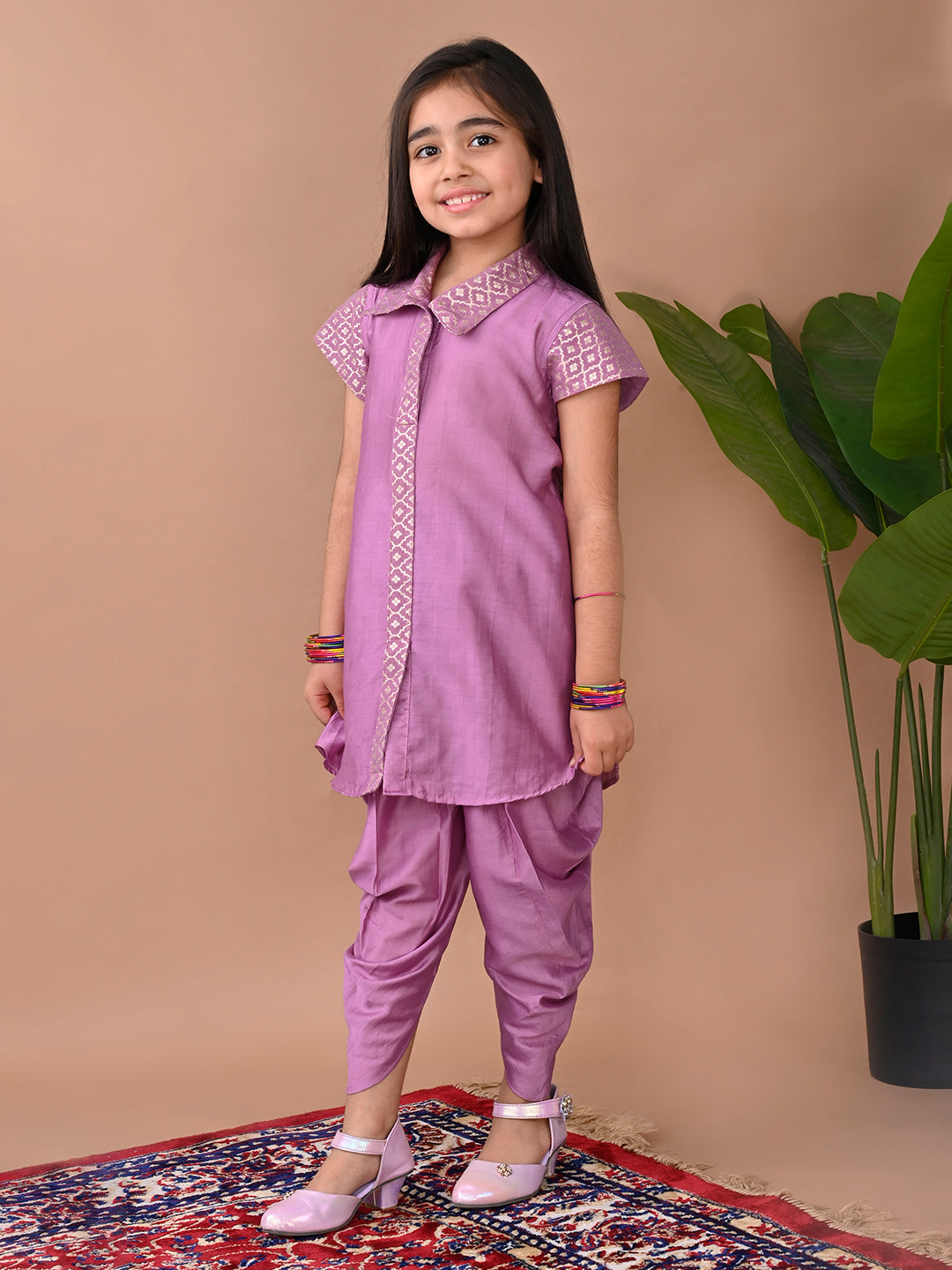 Purple jacquard shirt Kurti paired with dhoti