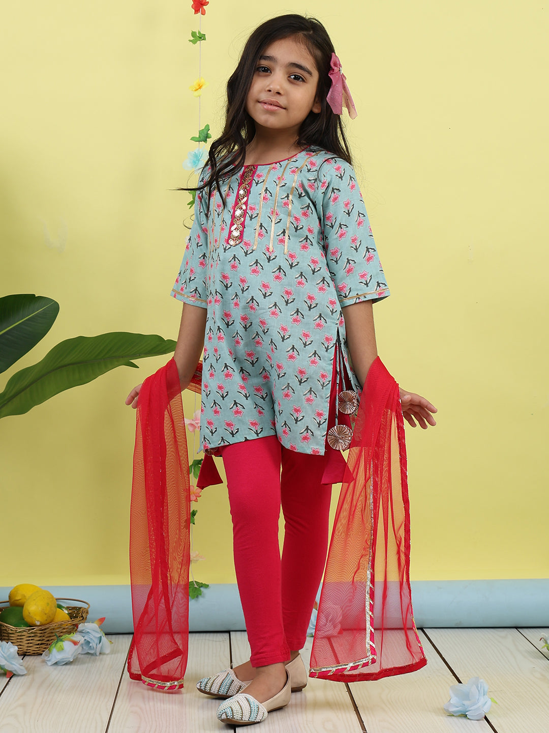 Green 3/4 sleeves printed cotton kurti paired with Pink leggings with Dupatta
