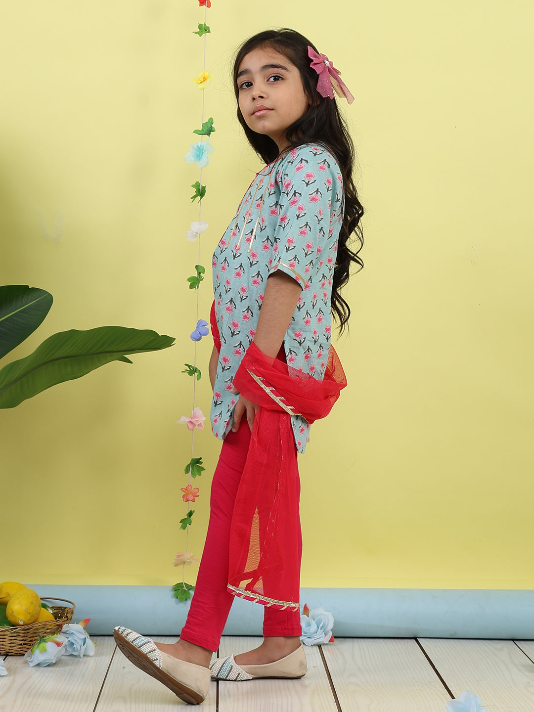 Green 3/4 sleeves printed cotton kurti paired with Pink leggings with Dupatta