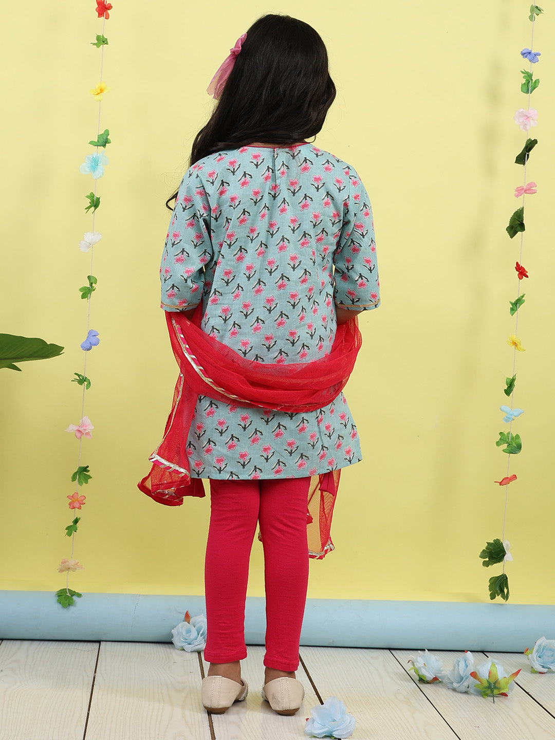 Green 3/4 sleeves printed cotton kurti paired with Pink leggings with Dupatta