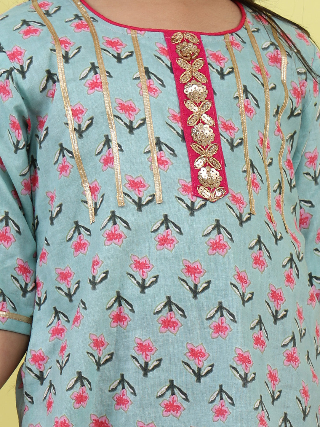 Green 3/4 sleeves printed cotton kurti paired with Pink leggings with Dupatta