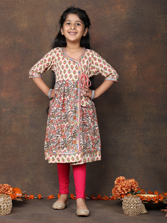 Peach 3/4 sleeves printed cotton Angrakha Kurti paired with Pink Leggings