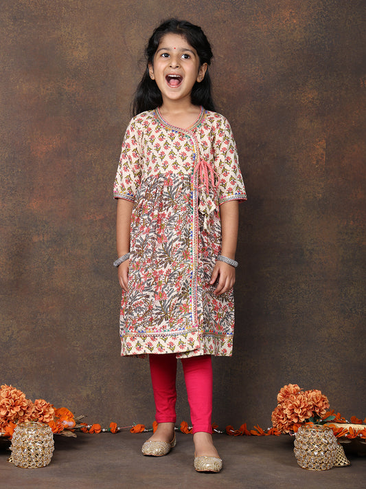 Peach 3/4 sleeves printed cotton Angrakha Kurti paired with Pink Leggings