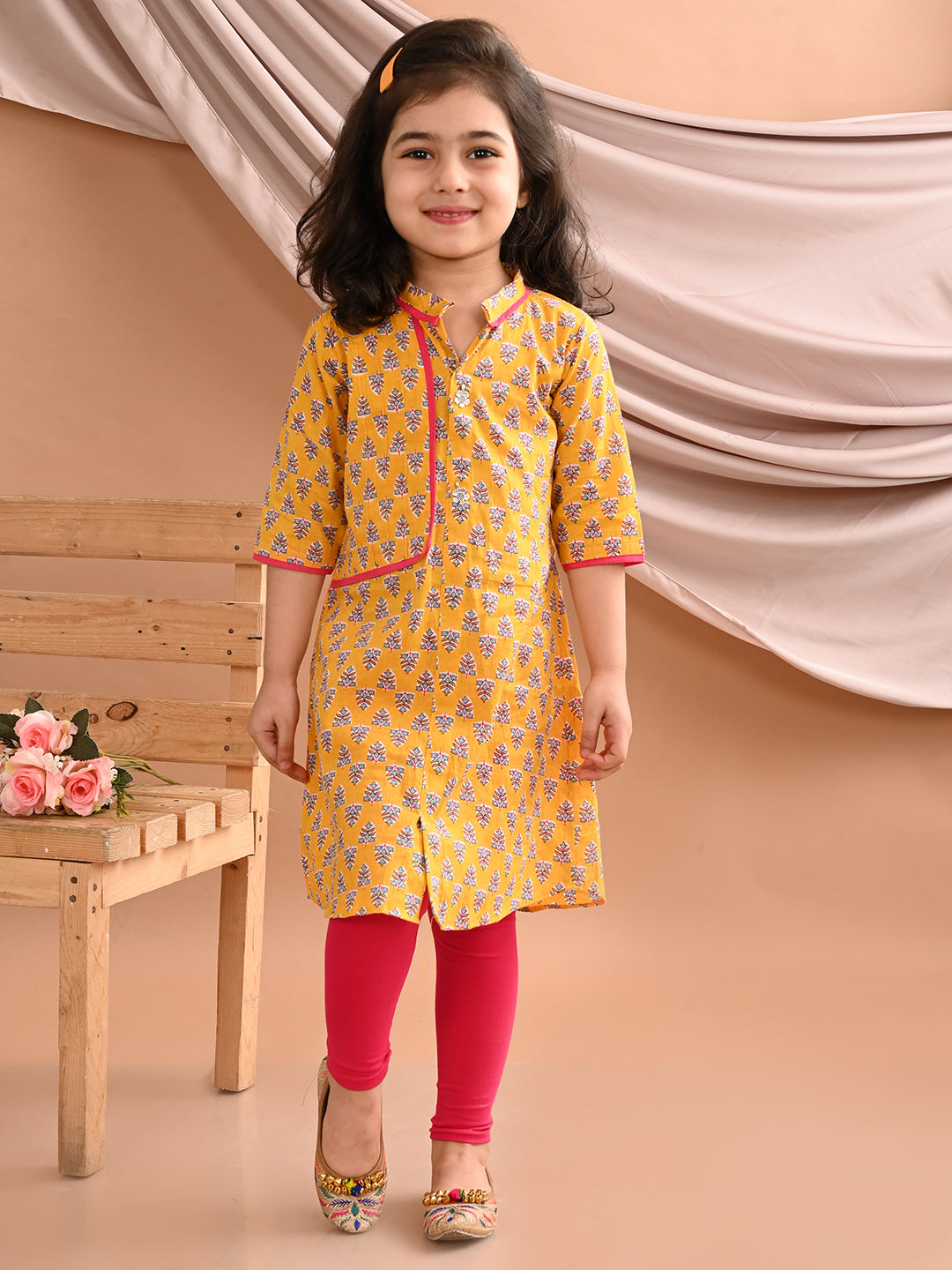Yellow floral printed kurti with pink leggings