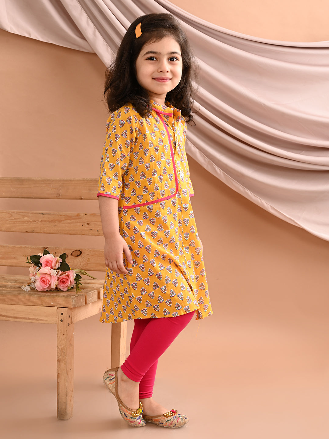 Yellow floral printed kurti with pink leggings