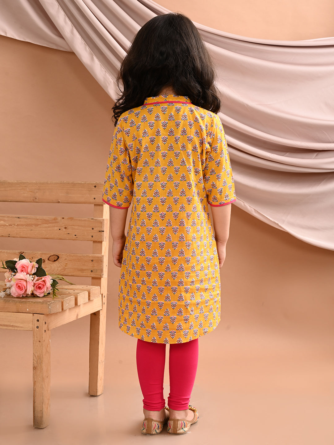 Yellow floral printed kurti with pink leggings