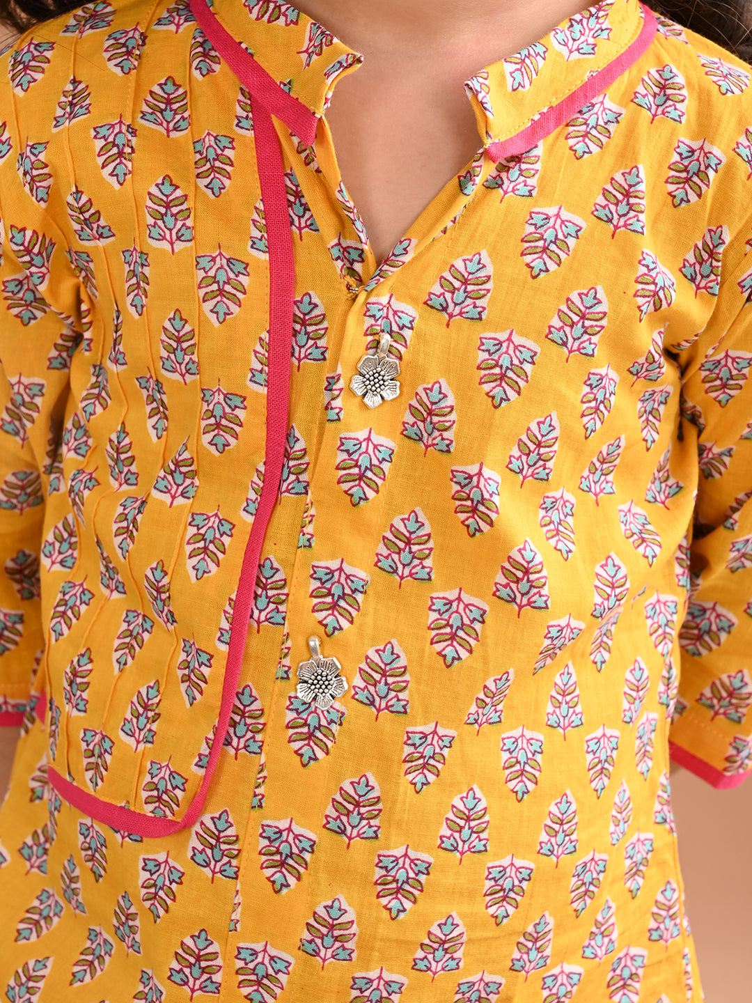Yellow floral printed kurti with pink leggings