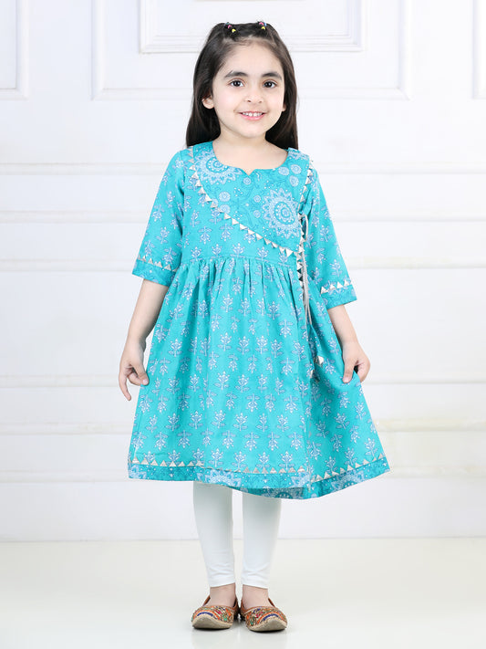 Blue printed angrakha style kurti with white leggings