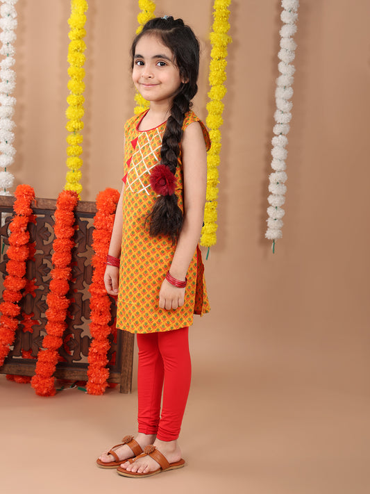 Yellow sleeveless cotton kurti with Red leggings