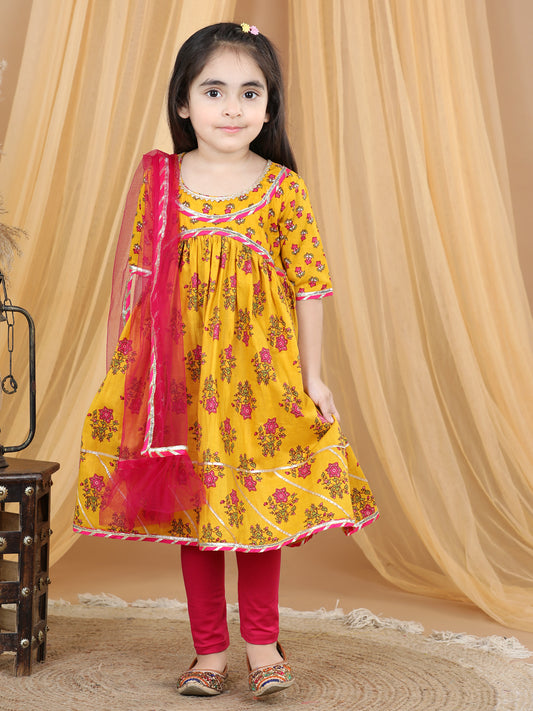 Yellow printed flared style kurti with pink leggings