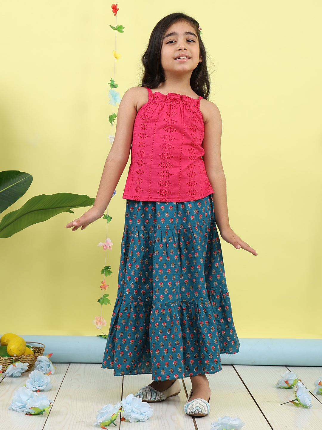Pink sleeveless tie on hakoba top with blue floral printed Skirt