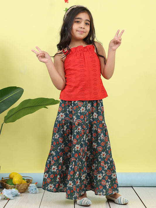 Red sleeveless tie on hakoba top with blue floral printed Skirt