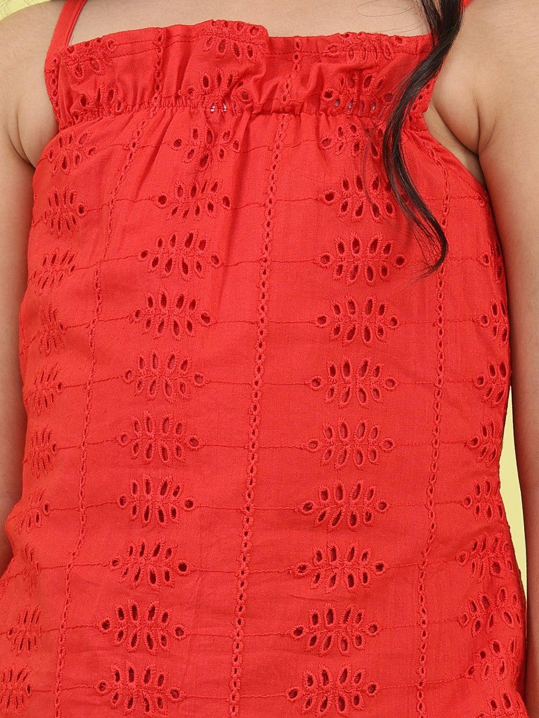 Red sleeveless tie on hakoba top with blue floral printed Skirt