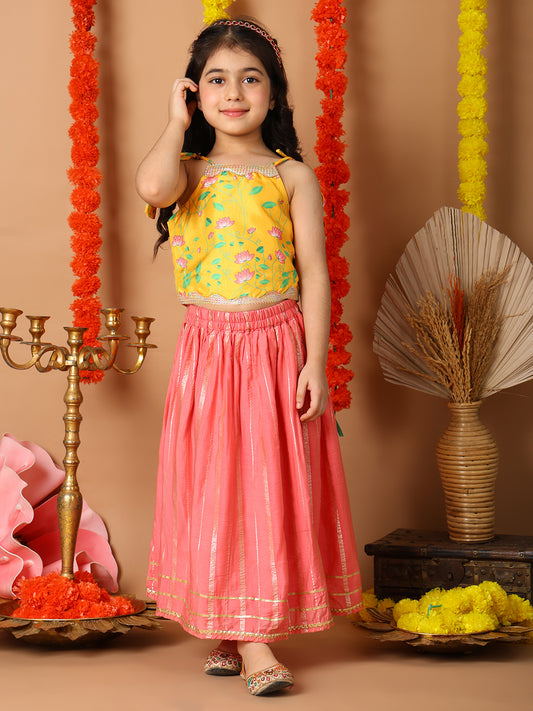 Yellow Printed sleeveless top with pink golden lehenga