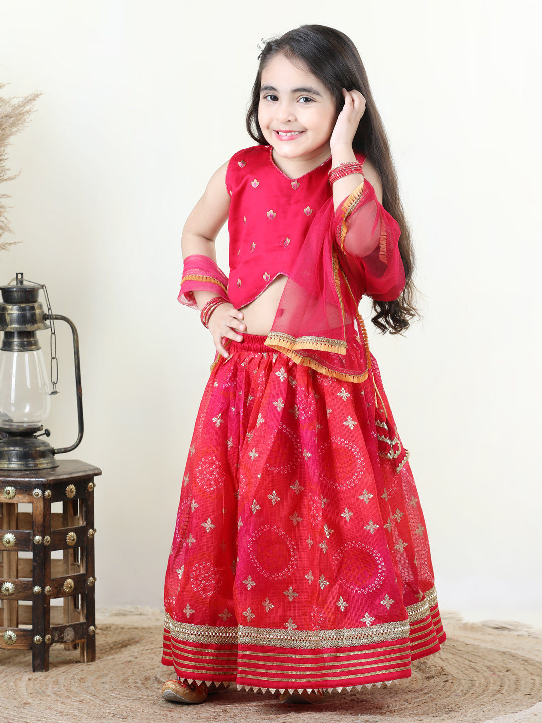 Pink Embroidered Top with gold printed lehenga and dupatta