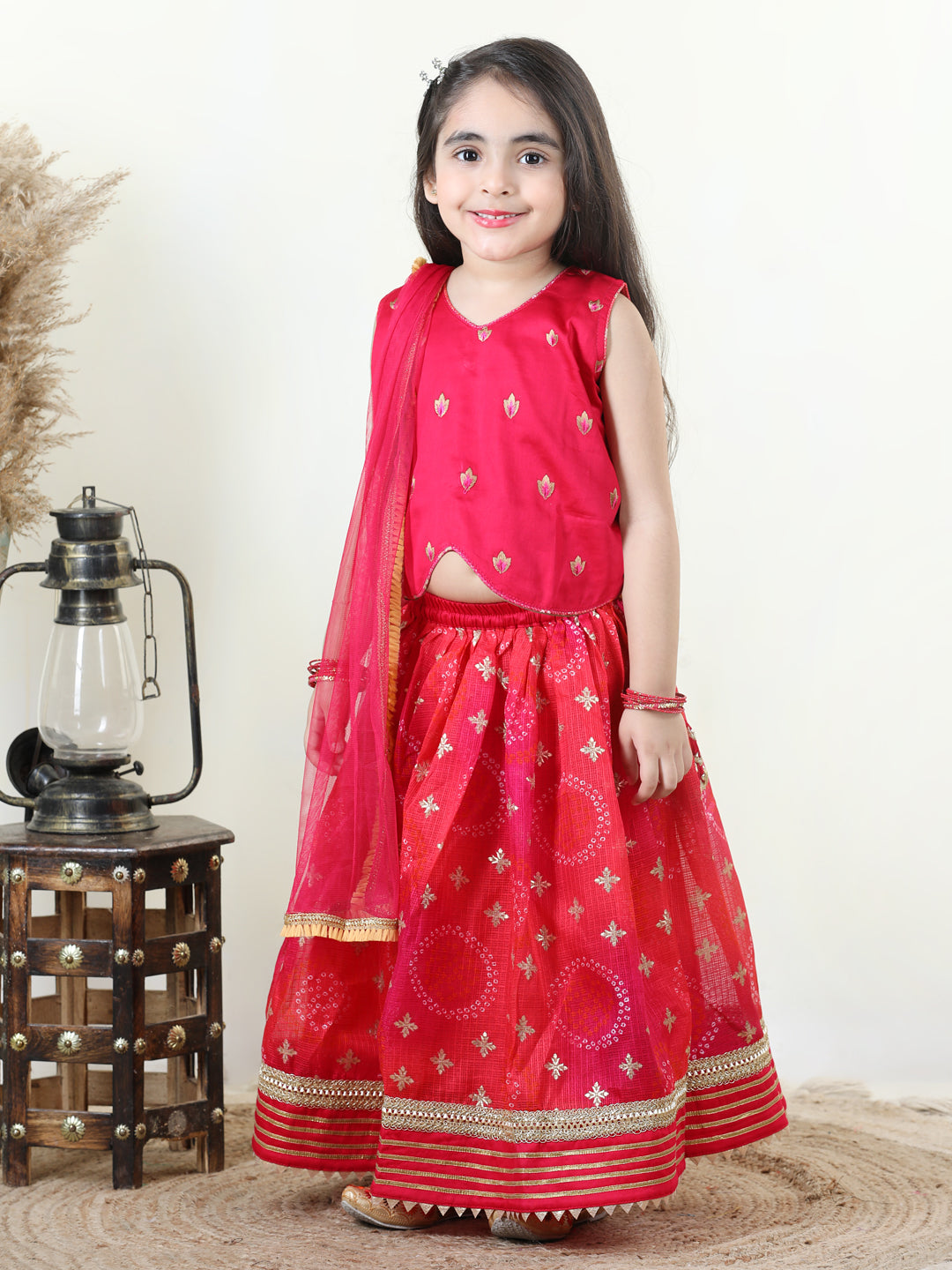 Pink Embroidered Top with gold printed lehenga and dupatta