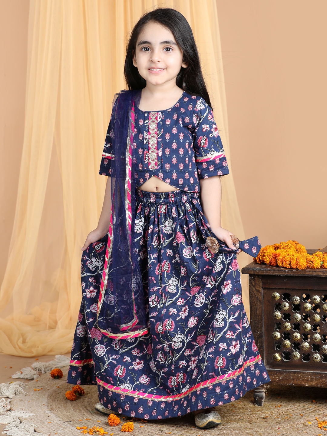 Floral printed Lehenga paired with lace work top and dupatta