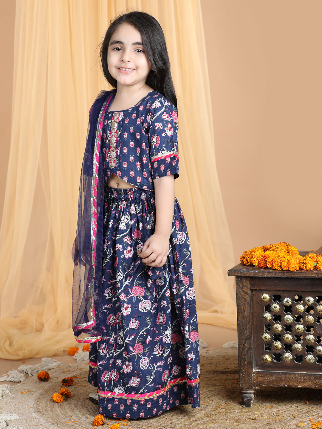 Floral printed Lehenga paired with lace work top and dupatta