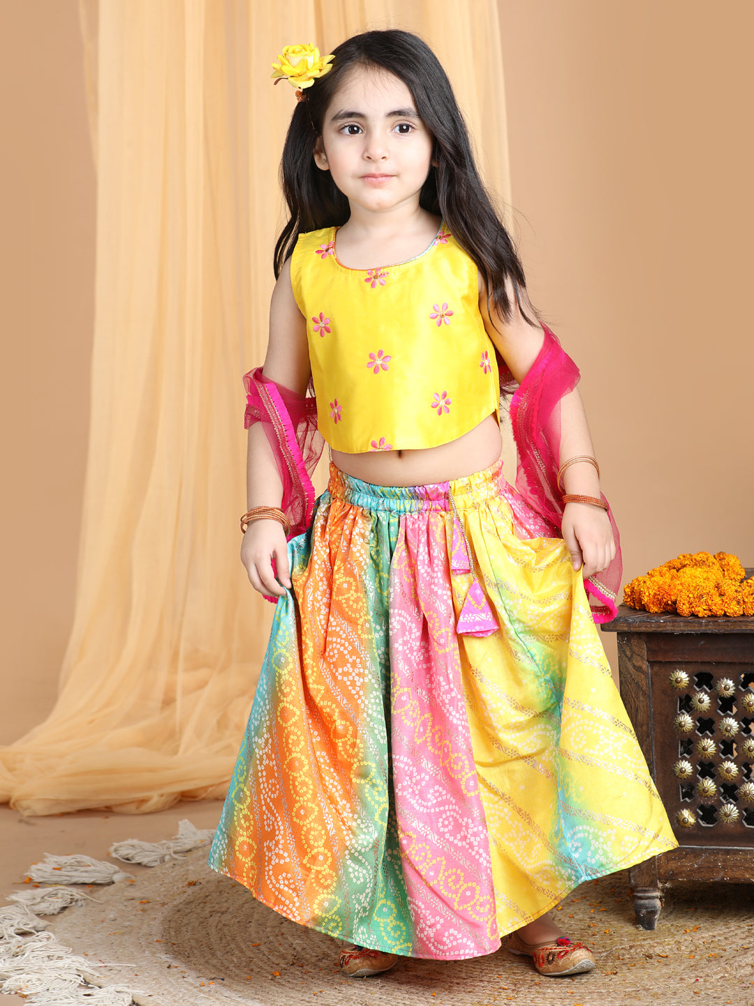 Yellow Top with multi color gold printed lehenga and dupatta