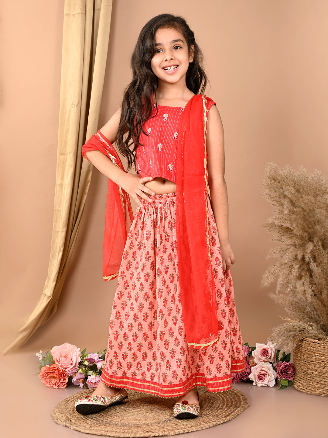 Peach katha floral printed Lehenga with sleeveless embroidered top and dupatta