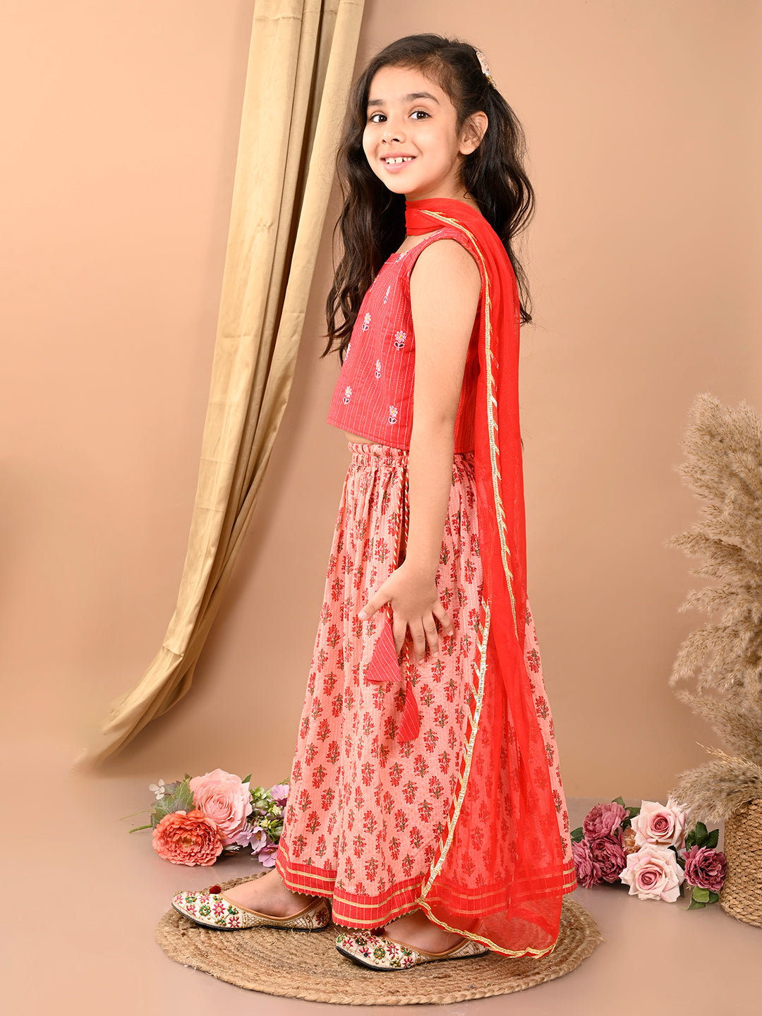 Peach katha floral printed Lehenga with sleeveless embroidered top and dupatta