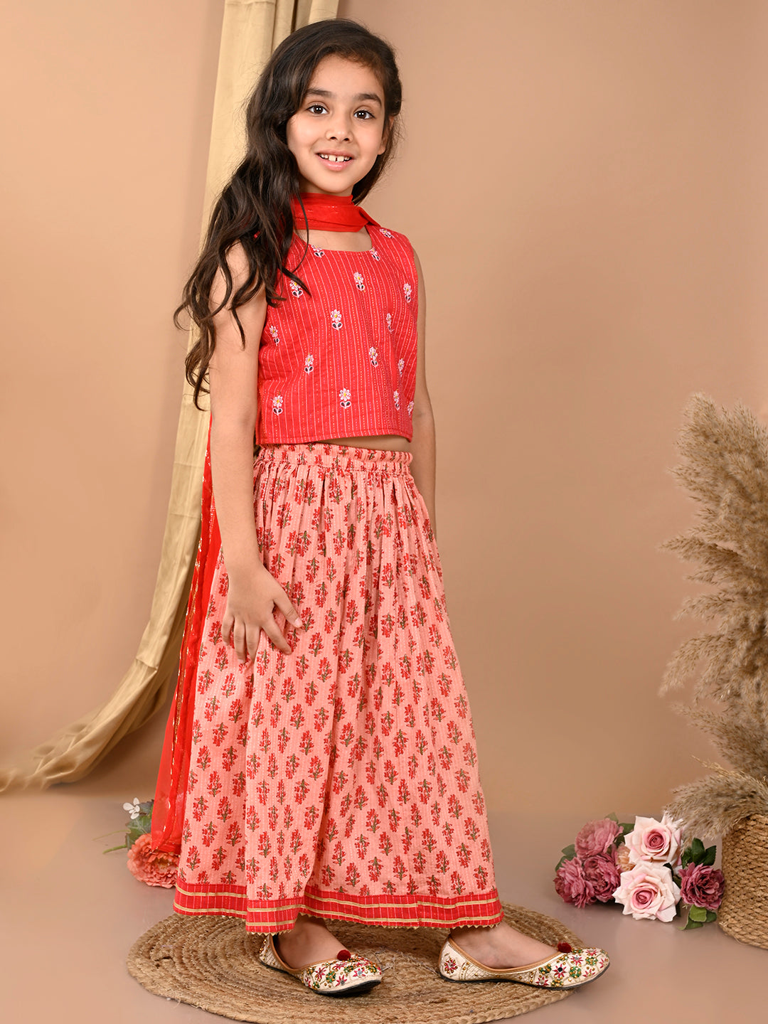 Peach katha floral printed Lehenga with sleeveless embroidered top and dupatta